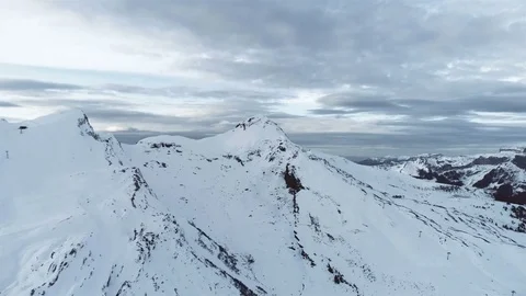 Flight over snowy mountains at sunset, Switzerland, Europe Stock Footage 83287922