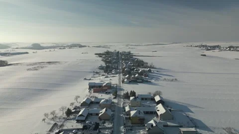 Flight over a snowy village Stock Footage 257611253