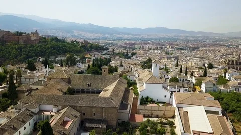 Flight over Spanish Rooftops and Gardens in Granada (Graded) Stock Footage 85868297