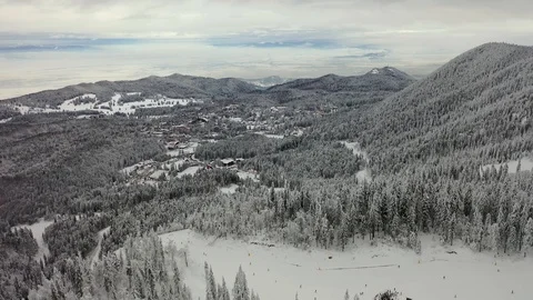 Flight over the spectacular ski slopes in the Carpathians mountains Stock Footage 104883463