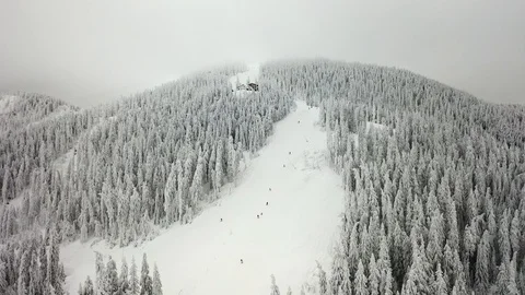 Flight over the spectacular ski slopes in the Carpathians mountains Stock Footage 104883472
