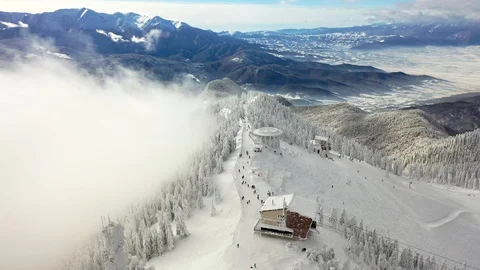 Flight over the spectacular ski slopes in the Carpathians mountains Stock Footage 104883478