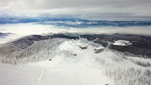 Flight over the spectacular ski slopes in the Carpathians mountains Video stock 104883480
