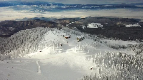 Flight over the spectacular ski slopes in the Carpathians mountains Stock Footage 104883495