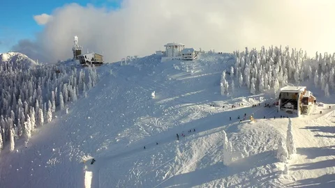 Flight over the spectacular ski slopes in the Carpathians mountains Video stock 104883497