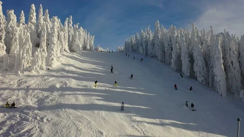 Flight over the spectacular ski slopes in the Carpathians mountains Stock Footage 104883504
