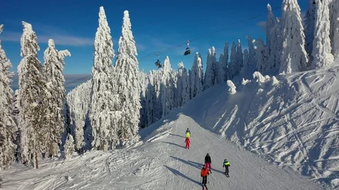Flight over the spectacular ski slopes in the Carpathians mountains Stock Footage 104883510