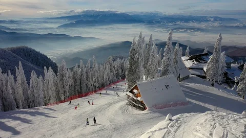 Flight over the spectacular ski slopes in the Carpathians mountains, Panorami Stock Footage 129615030