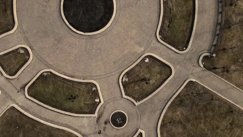 Flight over the spring city park. Walkways are visible. Patterns of park alleys. Stock Footage 150511204