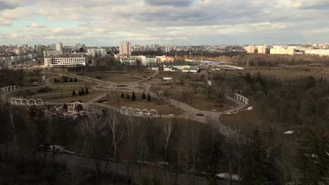 Flight over the spring city park. Walkways are visible. Patterns of park alleys. Stock Footage 150511229