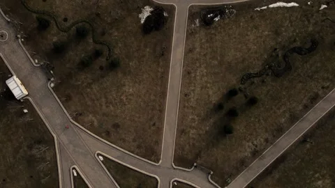 Flight over the spring city park. Walkways are visible. Patterns of park alleys. Stock Footage 150511260