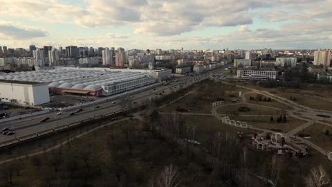 Flight over the spring city park. Walkways are visible. Patterns of park alleys. Stock Footage 150563484
