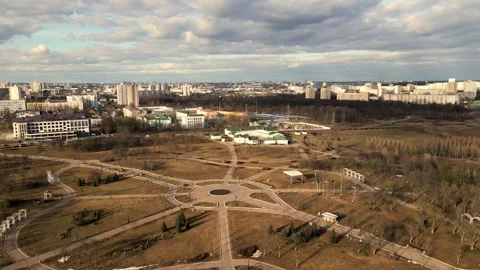 Flight over the spring city park. Walkways are visible. Patterns of park alleys. Stock Footage 150563639