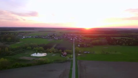 Flight over spring fields and polish village. Stock Footage 153931656