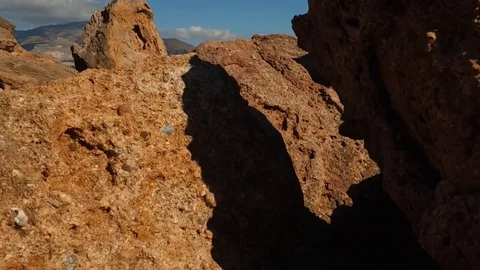 Flight over stone 3 Stockbeeldmateriaal 97839615