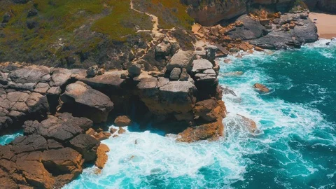 Flight over Stony Beach and Waves Stock Footage 108191033