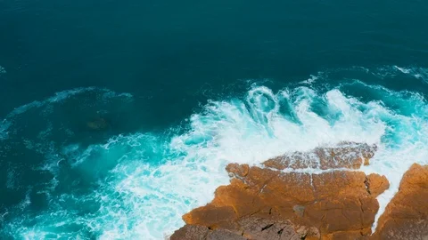 Flight over Stony Beach and Waves Stock Footage 108191107