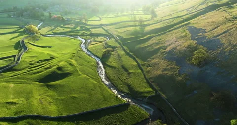 Flight over sunny valley in Yorkshire Dales Stock Footage 335074055
