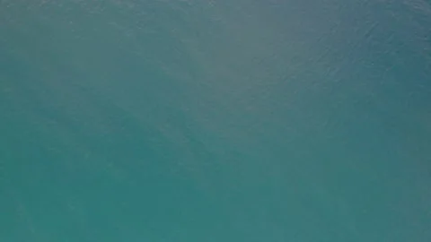A flight over the surface of a calm ocean. Stock Footage 189836476