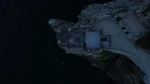 Flight over the Swallow's Nest castle and the Black Sea at sunset in Crimea. Stock-Footage 155451483