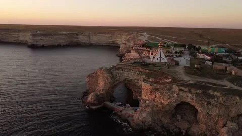 Flight over the temple chapel of St. Nicholas on Cape Tarkhankut on the Crimea. Stock-Footage 168899676