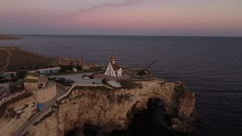 Flight over the temple chapel of St. Nicholas on Cape Tarkhankut on the Crimea. Stock-Footage 168899840
