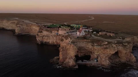 Flight over the temple chapel of St. Nicholas on Cape Tarkhankut on the Crimea. Stock-Footage 168899998