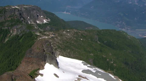 Flight over timbered ridge in Canadian Cascades, British Columbia Stock Footage 59526675