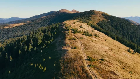 Flight over the top of the mountain. Untouched nature in the national park of Stock Footage 179921801