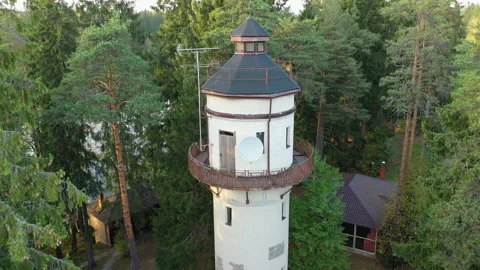 Flight over a tower in the countryside Video stock 147109504