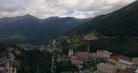 Flight over a town in the Alps in summer. Stock Footage 104708623