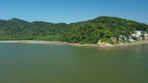 Flight over tropical beach and atlantic forest Stock Footage 127593794
