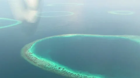 Flight over a tropical islands Stock Footage 132246786
