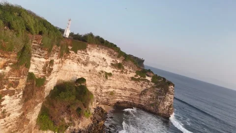 Flight over Uluwatu cliff on sunset, Bali, Indonesia. Stock Footage 282682594