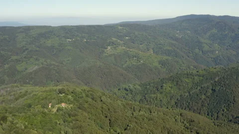 Flight over a  vast rural mountain terrain Stock Footage 137313166
