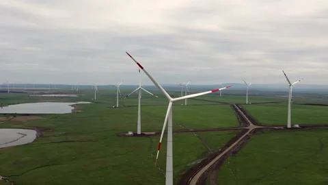 Flight over the windmills installed in the field. Stock Footage 229770443