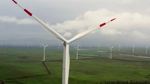 Flight over the windmills installed in the field. Stock Footage 230259924