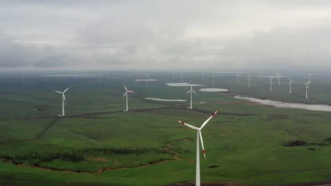 Flight over the windmills installed in the field. Stock Footage 230264585
