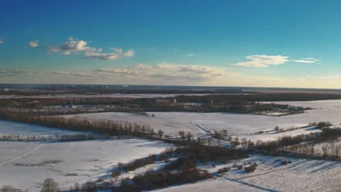 Flight over winter fields and forests in the suburbs of St. Petersburg 44 Stock Footage 136061299