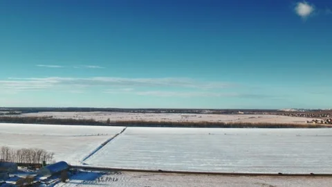 Flight over winter fields and forests in the suburbs of St. Petersburg 32 Stock Footage 136061869
