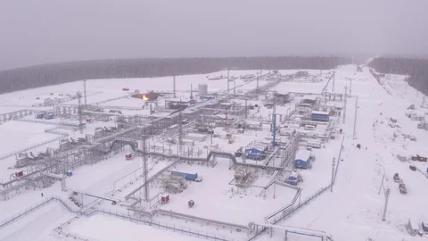 Flight over winter gas field Video stock 123710487