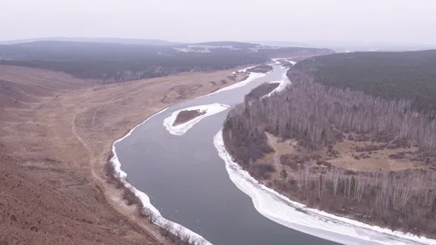 Flight over winter Lena river Stock Footage 123711343