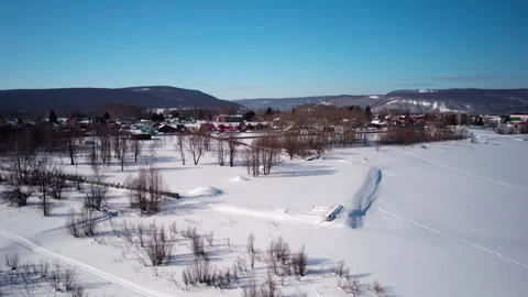 Flight over a winter village Stock Footage 331519399