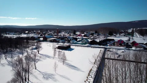 Flight over a winter village Stock Footage 332481957