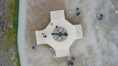 Flight over World Globe monument at North Cape Stock Footage 128448386