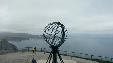 Flight over World Globe monument at North Cape Stock Footage 128450271