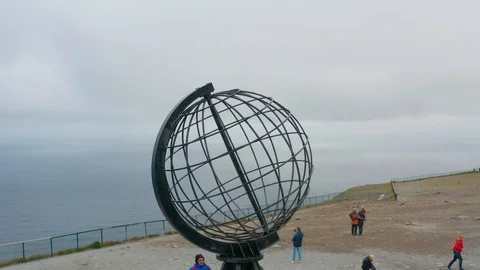 Flight over World Globe monument at North Cape Stock Footage 128509953