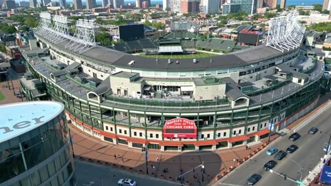Flight over Wrigley Field Baseball stadium - home of the Chicago Cubs - CHICAGO Vídeo Stock 244180782
