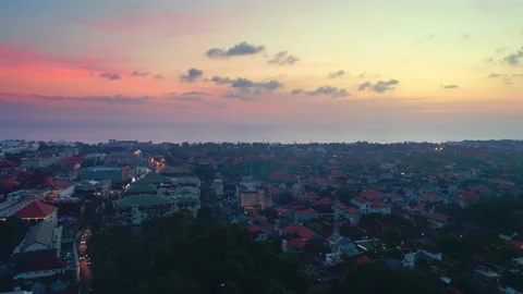 Flight overlooking the city of Bali on the Indian Ocean 1 Stock Footage 135968614