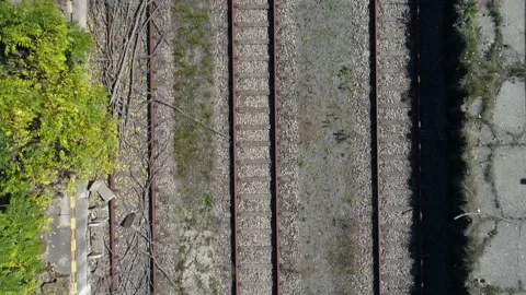 Flight pan across train tracks  Видео 144820992